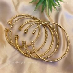 "18k women Gold adjustable Bangles gift for Women | Dubai Gold Bangles for Women | bangle | gold bracelet | adjustable bangle | gift for her | bangle set. Size: inner diameter 2.8\", Lenght 7\" adjustable fit for any wrist size. available 5 style/pattern 💖Price for one bangle buy more to make them glamour look. 18k Gold Plated High quality Not Tarnish and hypoallergenic you will love them! perfect for party or hangout with friends. 🦋Jewelry Care: As with all pieces that are not real gold, it i Resizable Gold-plated Bracelets, Gold Resizable Cuff Bracelet Gift, Elegant Gold Resizable Cuff Bracelet, Elegant Resizable Gold Cuff Bracelet, Gold Bangle Bracelet As Gift For Her, Adjustable Dainty Gold Plated Bangle, Gold Bangle Jewelry As Gift For Her, Resizable Bangle Cuff Bracelet For Gift, Resizable Bangle Cuff Bracelet As Gift