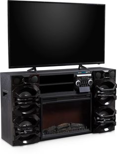 an entertainment center with speakers and a large television on it's stand in front of a white background