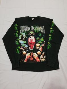 Original 1990s Cradle of Filth long sleeve. This is a true vintage shirt, not a modern reproduction. The condition of the tshirt is good. Condition: Holes or Pulls: No Stains: Yes Tears: No Tag: Anvil Size: X-Large Material: 100cot Measurements: Armpit to Armpit: 22.5 Top to Bottom: 30 Overall the condition is still good. The color still very bright and the printing show no cracking. T-shirts sold as it is found Haven't attempt to wash **POSTING**POSTAGE** *ITEM IS LOCATED IN MALAYSIA* ALL ITEM Alternative Long Sleeve T-shirt For Fall, Retro Long Sleeve Tops With Graphic Design, Vintage Graphic Tops For Fall, Green Band Merch Top For Fall, 90s Style Long Sleeve T-shirt For Fall, Oversized Long Sleeve Tops In Alternative Style, 90s Long Sleeve T-shirt For Fall, Vintage Long Sleeve T-shirt For Winter, Alternative Long Sleeve Fall T-shirt