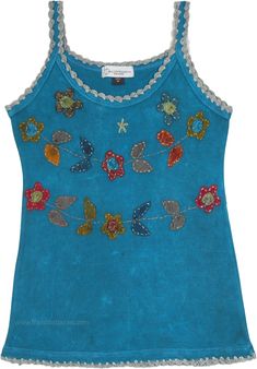 A stonewashed blue sleeveless tank top reminiscent of the ocean waves is perfect to keep you cool and calm this summer.  The 100% cotton top has a gorgeous detailing of floral applique work, handmade in the foothills of the Himalayas. #tlb #Sleeveless #Stonewash #Applique #vacationclothing #beachwrap #bohemianfashion #Handmade #bohotanktop #summerhippietanktop #cottontanktop Summer Cotton Embroidered Tank Top, Summer Embroidered Cotton Tank Top, Light Blue Cotton Beach Top, Bohemian Blue Cotton Tops, Blue Cotton Bohemian Tops, Blue Bohemian Cotton Tops, Bohemian Cotton Embroidered Tank Top, Bohemian Tank Top With Floral Embroidery, Bohemian Embroidered Cotton Tank Top