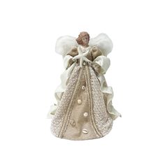 an angel figurine with white wings and gold dress is shown on a white background