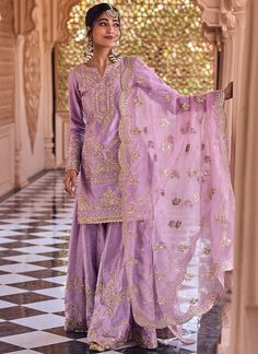 Our Dusty Purple Embroidered Sharara includes a satin top, santoon bottom, and an organza dupatta. Embroidery is present on this style using zari, thread, stone, and hand work.  Like all of our pieces, this piece is made in India and checked by hand to ensure high quality. Organza Dupatta Embroidery, Gharara Designs, Dupatta Embroidery, Embroidered Sharara, Shadi Dresses, Embroidery Fashion Detail, Punjabi Outfits, Indian Bridal Lehenga, Traditional Indian Dress