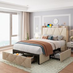 a bedroom with a bed, nightstands and large window overlooking the cityscape