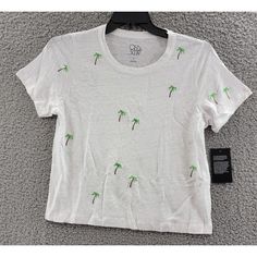 Chaser Embroidered Palm Tree Linen Blend Tee Men'S L White Multi Crew Neck S/S~ Chaser Embroidered Palm Tree Linen Blend Tee Men's L White Multi Crew Neck S/S Retail $79.00 Add A Touch Of Casual Elegance To Your Wardrobe With This Chaser Pineapple Women's Knit Crewneck Graphic T-Shirt. Made Of A Breathable Spandex And Linen Blended Fabric, This T-Shirt Has A Crew Neckline, Short Sleeves, And A Pullover Closure. The Embroidered Pineapple Accent On The Front Adds A Unique Touch To This Basic Summer Cotton Shirt With Embroidered Logo, White Tops With Embroidered Logo For Spring, Casual Short Sleeve Tops With Embroidered Logo, Relaxed Fit Top With Embroidered Logo For Summer, Summer Tops With Relaxed Fit And Embroidered Logo, Casual Embroidered Crew Neck Top, Casual Shirt With Floral Embroidery For Vacation, Casual White Tops With Embroidered Logo, Casual Embroidered T-shirt For Summer