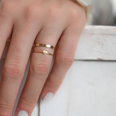 Our super fine and dainty heart Gold filled ring is perfect for a minimalist statement. So versatile our heart ring is great for stacking and pretty enough to stand on it's own. Mix and Match to stack your favourite rings. Simple, clean and so pretty 14 Karat Gold Filled Heart ring. Won't tarnish! Ring sizes 6 through 8 available. Rings sold as individuals if you would like multiple please select from drop down menu. * ＤＥＴＡＩＬＳ - 14k gold filled - Ships next business day - Made in Oakville, ON. * Dainty Simple Design Heart Promise Ring, Dainty Gold Heart Ring For Promise, Dainty Heart Ring With Simple Design For Promise, Minimalist Stackable Rings With Heart Charm For Promise, Minimalist Heart Shaped Stackable Promise Rings, Minimalist Simple Design Heart Promise Ring, Minimalist Heart Ring For Wedding, Minimalist Stackable Rings With Heart Charm For Anniversary, Minimalist Stackable Heart Promise Ring