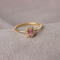 Tourmaline stone; Provides balance and harmony.It allows the person to focus on their goals.It provides sleep pattern.It strengthens and purifies the mind.It provides peace with oneself and purifies your inner world from evil. Our rectangular pink tourmaline stone ring surrounded by real diamonds will add elegance to your hands. It is a ring that you can use both on special occasions and in daily life. It is a beautiful and stylish product that you can gift to yourself and your loved ones. The c Gold Ring With Pink Stone, Pink And Gold Ring, Elegant Gold Tourmaline Rings, Elegant Rectangular Tourmaline Ring, Marrying Rich, Rectangle Stone Ring, Pink Tourmaline Rings With Gemstone Accents, Elegant Pink Tourmaline Birthstone Ring, Pink Tourmaline Yellow Gold Ring