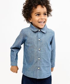 Breathable, durable twill for year-round comfort Signature Oso stacked buttons Pointed collar for classic look Made from the softest-ever cotton, this dress shirt is an evolution of our Jefferson shirt with a new, classic pointed collar. It features a play-ready fit with extra shoulder room so that active kiddos can freely move around. The flat shirt tail looks great untucked for a relaxed look or tucked in for a polished vibe. Classic Denim Shirt With Snap Buttons, Everyday Long Sleeve Dress Shirt With Button Closure, Classic Denim Shirt With Button Cuffs, Classic Denim Button Shirt, Classic Denim Shirt With Buttons, Collared Solid Denim Shirt, Solid Shirt With Button Cuffs For Everyday Wear, Solid Denim Collared Shirt, Solid Collared Denim Shirt