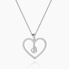 Customize your own heart initial necklace with your initials! Perfect for gifting to loved ones. Monogram Initial Pendant Name Necklace, Luxury Initial Pendant Name Necklace As Gift, Luxury Initial Pendant Necklace For Gift, Luxury Sterling Silver Initial Necklace With Monogram, White Gold Initial Necklace For Anniversary, Luxury Engraved Initial Pendant Necklace, Luxury Sterling Silver Monogram Initial Necklace, Luxury Initial Pendant Name Necklace With Initials, Luxury Initial Pendant Name Necklace