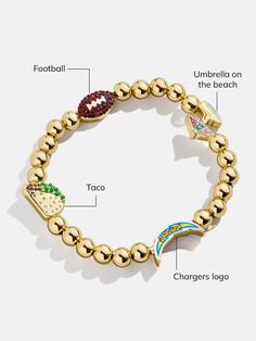 The Los Angeles Chargers NFL Charm Bracelet is the ultimate accessory for die-hard football fans. Each bracelet is a celebration of your favorite team, featuring the Chargers logo along with other charms related to the team and its iconic location. Perfect for game days or everyday wear, this bracelet adds a touch of sports-inspired elegance to any outfit. This bracelet features 6mm gold ball beads. This is an officially licensed NFL product. Chargers Logo, Chargers Nfl, Beaded Charm Bracelet, Nfl Games, Los Angeles Chargers, Bead Charm Bracelet, Die Hard, Football Fans, Favorite Team