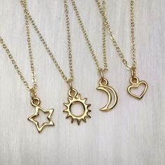 Sun Moon Star Heart friendship/ family necklaces D E T A I L S: Your choice of 10mm gold finished pewter Moon, Sun, Heart or Star pendant on 18" gold plated brass necklace, with tiny clasp closure.  Also available in silver (YES, you can mix gold and silver, leave me a note at checkout!) https://www.etsy.com/listing/500073607 ..: V I E W   S H O P:.. www.lotusfairy.etsy.com www.shopEarthshine.com ..: P O L I C I E S :.. Please see the drop down FAQs menu All items are FINAL SALE. ★ I M P O R T A Adjustable Gold Charm Necklaces With Heart Charm, Gold Heart Charm Necklace For Best Friend, Gold Heart Charm Necklaces For Friendship, Gold Charm Necklaces For Valentine's Day And Friendship, Gold Pendant Charm Necklace For Friendship, Dainty Nickel-free Necklaces For Friendship, Hypoallergenic Gold Jewelry For Best Friend Gift, Nickel-free Gold Jewelry For Best Friend Gift, Personalized Gold Celestial Charm Necklaces