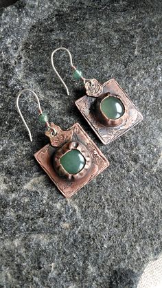 "Handmade earrings \"Patterns of Time\" will set the mood and add charm to your everyday look. The green gemstone will accentuate the color of your eyes or your outfit! It's essential to remember that earrings, with their color and shape, complete your overall appearance!" Artisan Green Brass Earrings, Green Copper Earrings For Gift, Artisan Green Copper Jewelry, Green Gemstone Artisan Earrings, Green Artisan Gemstone Earrings, Artisan Green Gemstone Earrings, Pierced Green Copper Earrings, Handmade Drop Earrings For May Birthstone, Green Copper Pierced Earrings