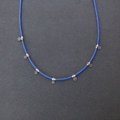 Single strand of round turquoise or lapis lazuli stones and silver beads Approximately 18 inches long Puppy Paw Prints, Nike Air Jordan 6, Puppy Paws, Lapis Lazuli Stone, Coin Necklace, Short Necklace, Simple Necklace, Lapis Lazuli, Silver Beads