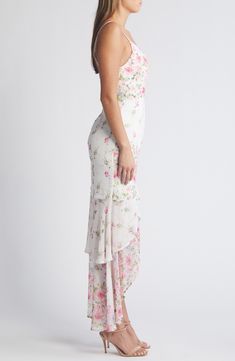 Made for summertime soirées, this freshly blooming maxi features slender straps and a gathered-to-flatter high-low skirt. 23" front length, 43" back length (size medium) Hidden back-zip closure Deep V-neck Adjustable straps High-low hem Lined 100% polyester Hand wash, line dry Imported Summer Flowy Maxi Dress, Tropical Dresses, Random Outfits, Cruise Dress, Floral High Low Dress, Floral Prom Dresses, Tropical Dress, High Low Skirt, Flowy Maxi Dress