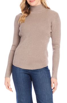 This stretchy top detailed with a cute mock neck makes a perfect layering piece. 25" length (size Medium) Mock neck Long sleeves 70% rayon, 30% nylon Hand wash, dry flat Imported Fall Layering Mock Neck Knit Top, Knit Mock Neck Top For Fall Layering, Fall Knit Mock Neck Top For Layering, Knit Turtleneck For Layering, Casual High Neck Top For Layering, Fitted Knit Top For Layering, Versatile Turtleneck Sweater For Spring, Mock Neck Top For Work, High Neck Fitted Top For Layering