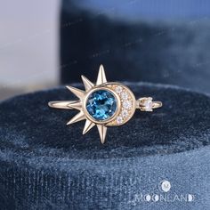 Celestial Wedding Ring Women London Blue Topaz Engagement Ring Vintage Yellow Gold Sun Ring Crescent Bridal Ring Unique Moon Star Ring Gift 🌙 Product Details -Center Stone: London Blue Topaz, 5mm, Round Cut -Accent Stone: Moissanite, 0.07CT Total -DEF/VVS-VS -Ring Band: 1.8mm -Metal Choice: 10K, 14K or 18K Solid Gold (Rose, White, or Yellow) and Platinum **Handmade in the US The making process is about 3-4 weeks!! 🌙 MoonLandUS Service Available - Accept return and exchange for normal orders. A Moon And Sun Engagement Ring, Celestial Wedding Ring, Moon And Sun Ring, Moon Engagement Ring, Moon Star Ring, London Blue Topaz Engagement Ring, London Blue Topaz Engagement Rings, Wedding Ring Women, Sun Ring