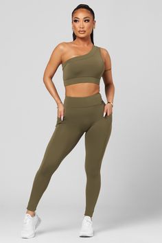 The silhouette that everyone loves, just elevated. With a wide band for extra support and a sleek design for a more classy look, our new Classic One Shoulder is the perfect edition to your favorite legging. The details: Supportive, covered elastic band Removable Pads Quick-dry fabric 75% nylon / 25% spandex One Shoulder Bra, Gym Fits, Hidden Pocket, New Classic, How To Look Classy, Wide Bands, Printed Leggings, Pet Hair, Elastic Band