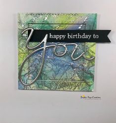 a happy birthday card with the word joy on it