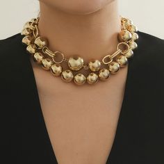 This Double Layered Faux Pearl Necklace comes in three stunning color options: Gold, White, and Gold+White. Elevate your style with this elegant and versatile necklace that is sure to turn heads. Material: imitation pearl+aluminum chain Trendy Gold Pearl Necklace With Chain, Party Alloy Pearl Chain Necklace, Party Pearl Chain Necklace In Alloy, Chic Metal Jewelry With Pearl Chain, Round Metal Necklaces For Parties, Gold Alloy Necklaces For Party, Trendy Gold Ball Chain Necklace, Gold Pearl Chain Choker For Party, Round Pearl Chain Necklace For Parties