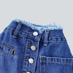 Introducing our 2023 Spring-Summer Collection ââ‚?the frayed waistband buttoned denim skirt. With its '90s-inspired design and high-waisted silhouette. this conventional stonewashed denim skirt will be your next summer staple.Why They're Your Next Summer Staple: Grunge Meets Glam: This denim skirt embodies rebellion and sophistication in one sleek package. Distressed Denim: With its distressed pattern. this skirt captures a raw. unfiltered essence. High-Waisted Fit: Its elevated-waisted silhouet High Waist Skirt With Frayed Hem, Summer Blue Denim Skirt With Button Zip Fly, Trendy Dark Wash Denim Skirt With Button Zip Fly, Cotton Denim Skirt With Button Zip Fly, Summer Straight Leg Skirt With Button Closure, Trendy Medium Wash Denim Skirt With Button Zip Fly, Denim Blue Cotton Skirt With Button Zip Fly, Denim Blue Cotton Denim Skirt With Button Zip Fly, Trendy High Waist Denim Skirt With Frayed Hem