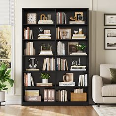 a living room filled with lots of books on top of a black book shelf next to a white couch