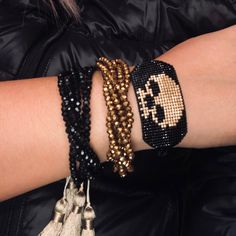 This Listing Is For The Black And Gold Skull Bracelet. It Is Gorgeous, It Can Be Worn By Itself Or Layered As Shown In First And Second Picture. Handmade Bracelet, Handmade In Mexico Handmade With Love Adjustable To Any Wrist. Casual Black Beaded Bracelets, Beaded Black Friendship Bracelet For Party, Black Hand Wrapped Beaded Bracelets For Festival, Hand Wrapped Black Beaded Bracelets For Festivals, Black Braided Bracelets For Festivals, Trendy Black Braided Bracelets For Festival, Festival Hand-wrapped Black Beaded Bracelets, Party Black Beaded Friendship Bracelet, Adjustable Handmade Skull Bracelets