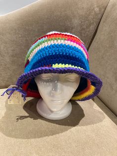 "hand crocheted bucket hat Size: XL 24-25\" head circumference Crown: 7-3/4\" Height: 10\" Width: 14\" Typical head circumference sizes: 21\" Xsmall 22\" Xs/Small 23\" Small/Medium 24\" Medium/Large 25\" Large/XL Materiel: 100% acrylic Wear to the beach or anywhere All my hats are one of a kind Head Size in Inches Head Size in Centimeters American Hat Sizes   Head Size in Inches                          Head Size in Centimeters                            American Hat Sizes 19 3/8\" Colorful Adjustable Casual Crochet Hat, Colorful Adjustable Crochet Hat, Casual Adjustable Colorful Crochet Hat, Casual Colorful Adjustable Crochet Hat, Multicolor Short Brim Cloche Hat For Beach, Adjustable Multicolor Cloche Hat For Beach, Multicolor Crochet Hat With Curved Brim For Vacation, Multicolor Yarn Bucket Hat For The Beach, Multicolor Crochet Hat For Festival, One Size