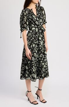 An effervescent floral pattern blossoms on a belted midi dress complete with impeccable puff sleeves. 44" length (size Medium) Front button closure Split neck Short sleeves Removable tie belt Partially lined 98% polyester, 2% spandex Hand wash, line dry Imported Belted Midi Dress, Floral Print Midi Dress, Print Midi Dress, Nordstrom Dresses, Tie Belt, Puff Sleeves, Puff Sleeve, Floral Pattern, Pear