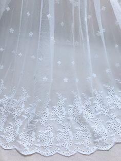 Soft floral embroidery lace fabric by the yard. Perfect for dress making, bridal wear, wedding gown, flower girl dress or curtains. Listing is for ONE YARD. ( Additional quantities are available.) Fabric width approx: 53.1 Inches (135 cm) ..♥ ¸¸..♥ ¸¸..♥ ..♥ ¸¸..♥ ¸¸..♥.. Wholesale acceptable! MORE FABRICS https://www.etsy.com/shop/lacelindsay?section_id=14156869 Feel free to contact me with any questions. To view all our items please click here: .**' http://www.etsy.com/shop/lacelindsay .**' White Embroidered Fabric With Lace Trim For Ceremonies, Ceremony White Dress With Intricate Embroidery, White Lace Trim Wedding Dress For Ceremony, White Wedding Dress With Lace Trim For Ceremony, White Embroidered Lace Fabric For Ceremony, White Floral Embroidered Lace For Summer Wedding, White Floral Embroidery Lace For Summer Weddings, Ceremonial White Embroidered Fabric With Lace Work, Summer Wedding Lace With Floral Embroidery