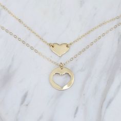 "Mother Daughter Necklace Set. 14K gold necklace Mother's necklace: - 14K gold charm is about 13mm. - 14K gold necklace Daughter's Necklace: - 14K gold heart charm is about 10mm x 8mm - 14K gold necklace Necklace size chart: average 0 - 12 months 10\" average 12 - 24 months 12\" average 2-3 years 13\" average 4-5 years 14\" average 5-10 years 15\"-16\" 14K gold components Your necklaces will be shipped in a gift box. To see other Mother daughter set click here: https://www.etsy.com/shop/SashJewe 14k Gold Filled Yellow Gold Charm Necklace For Anniversary, Everyday 14k Gold Open Heart Charm Necklace, Gold Double Heart Charm Necklace, Everyday Double Heart 14k Gold Charm Necklace, Everyday 14k Gold Double Heart Charm Necklace, Everyday 14k Yellow Gold Filled Heart Necklace, 14k Gold Filled Charm Necklace For Valentine's Day Gift, 14k Gold Filled Yellow Gold Charm Necklace For Mom, Wedding Jewelry With 14k Gold-filled Heart Charm