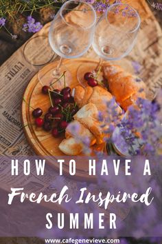 two glasses of wine on a plate with bread and grapes next to it, the words how to have a french summer