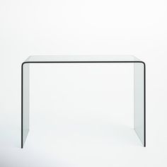 a glass and metal table against a white background with no one around it or someone else