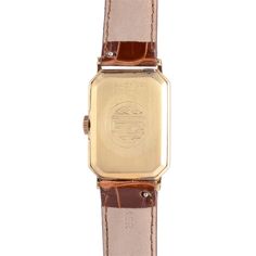 Vintage Swiss E Gubelin 14K wrist watch, circa 1930. This 14 karat yellow gold wrist watch by E Gubelin has a rectangular shape and features the restored original silver dial with enamel numerals and a 17 jewel movement. This rare model is all hand constructed. Case #4405144, cal #9.47. Warranty This watch comes with a full 18 month warranty from the date of purchase. Item #SSHO 404 Vintage Yellow Gold Rectangular Watch Band, Antique Rectangular Watch Band For Formal Occasions, Antique Gold Rectangular Watch Bands, Rectangular Yellow Gold Watch Bands For Gift, Yellow Gold Rectangular Watch Bands For Gift, Yellow Gold Rectangular Watch Bands For Anniversary, Rectangular Yellow Gold Watch Bands As Gift, Yellow Gold Rectangular Watch Bands As Gift, Classic Rectangular Jewelry And Watches With Polished Finish