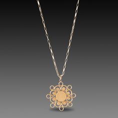 This lovely necklace features a 22k gold open mandala charm suspended from a textural, 14k gold paperclip chain. Wonderful worn alone, and layers beautifully with chains in our collection. Pendant measures approximately 1 inch tall. Matte finish. This piece is in stock and ready to ship. Mandala Necklace, Gold Mandala, Lovely Necklace, 22k Gold, Paper Clip, Chain Lengths, 1 Inch, Silver Necklace, Gold Necklace