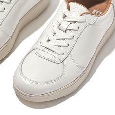 Our constantly popular Rally sneakers, but with curvy paneling. The classic round-toe 'tennis shoe' shape works with virtually everything (jeans, dresses, athleisure, tailoring). While the panels add detail and bring a slightly sportier vibe. This version crafted in crisp white high-quality leather. All on our ultra-light, perfectly cushioned Anatomicush™ midsoles, with flex lines cut across the bottom to let your feet move naturally. Supple. Softly padded. Casual. Your go-tos on busy days when Tennis Shoes, High Quality Leather, Leather Sneakers, Athleisure, Bring It On, Sneakers, Leather