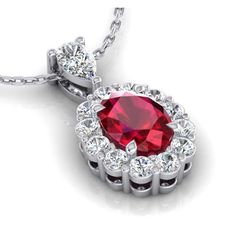 METAL SPECIFICATIONS White Gold 14K STONE SPECIFICATIONS Stone Name : Red Ruby and Diamond Stone Cut : Oval, Pear, and Round Stone Details : There is one oval shaped red ruby approx. 1.35 carats (Approx. Size 7 x 5 mm), one pear diamond approx. 0.23 carats (Approx. Size 5 x 3 mm) with approx. 0.54 carats of smaller round diamonds on the sides. Natural earth mined stones. Color : F Clarity : VS1 Quality of Ruby : AAA Total : Approx. 2.12 Carats PENDANT SPECIFICATIONS Length : 16” (Can change leng Red Oval Diamond Jewelry, Classic Red Oval Pendant Jewelry, Red Oval Fine Jewelry, Fine Red Oval Jewelry, Classic Red Teardrop Pendant Jewelry, Oval Gemstone Jewelry For Valentine's Day, Valentine's Day Oval Gemstone Jewelry, Red Oval Jewelry With Prong Setting, Elegant Red Oval Ruby Jewelry