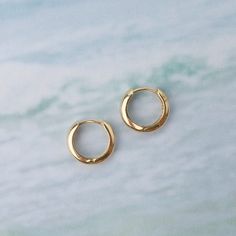 These Small 14k Yellow Gold Huggie Earrings are the perfect basic huggie for any occasion! 14k yellow gold 3mm width 12.5mm 14k White Gold Huggie Cartilage Earrings, Classic 14k Gold Filled Huggie Earrings For Anniversary, Classic Cartilage Earrings For Anniversary, Classic Tarnish-resistant Huggie Cartilage Earrings, Small Hoop 14k White Gold Jewelry, Classic 14k Gold Hoop Earrings For Everyday, 14k White Gold Small Hoop Jewelry, White Gold 14k Small Hoop Jewelry, Classic Tarnish Resistant Round Cut Earrings