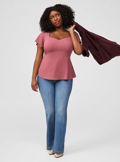 FIT Model is 5'10” wearing size 1. . Measures 28” from shoulder (size 2). MATERIALS + CARE Challis woven fabric: New, improved, and loved by all—and still lightweight, drapey, and (really! ) machine-washable. . Stretch level: None. . 82% rayon, 18% polyester. Machine wash cold. Line dry. Imported. DETAILS Sweetheart neckline. Short sleeves. Peplum detail. The best plus size women's peplum sweetheart top tops in wild ginger made of washchallis. Torrid is your destination for cozy fall and winter Torrid Outfits, Short Sleeve Peplum Top, Plus Size Peplum, Short Sleeve Top, Sweetheart Neckline, Plus Size Fashion, Woven Fabric, Plus Size Outfits, Short Sleeves Tops