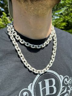 Men's 12mm wide iced rolo chain set with moissanite stones
Also knows as Hermes link
 
 
REAL VVS D Color MOISSANITE
Comes with GRA Certificate
PASSES DIAMOND TESTER!!! ANY PEN OR LIGHT TRANSMISSION DIAMOND TESTER (Will show up as moissanite and not diamond on lab assays however)
40.5-67.8ct (depending on length...for instance 24" is 54.1ct) genuine D Color VVS excellent cut moissanite stones..SO ICY THEY WILL BLIND YOU!...Iced on all sides as this is a rolo chain!
 
&nbs White Iced Out Chain Link Necklace, White Iced Out Chain Link Jewelry, Iced Out White Chain Link Jewelry, White Iced Out Cuban Link Necklace, Iced Out White Cuban Link Necklace, White Diamond Cuban Link Necklace, White Iced Out Chain Necklace, White Bling Necklaces For Streetwear, White Cuban Link Jewelry With Silver Chain