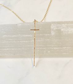 "This simple sleek cross necklace is very flattering and would make the perfect gift to show someone or yourself some love. It is hand forged from 14kt gold fill wire and hammered with a dappled texture to catch the light. The cross measures 2 1/4\" from top to bottom and just under 1/2\" across. The chain is 14kt gold fill fine cable and finished with a spring ring clasp and my signature large end ring. The length is 17\" but I can make it any desired length. Also available in sterling silver" Davidson Nc, Sterling Silver Cross Necklace, Gold Cross Necklace, Mom Necklace, Modern Cross, Gold Cross, Short Necklace, The Cross, Hand Forged