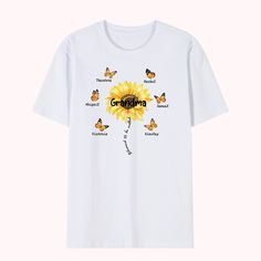 a white t - shirt with the words grandma written on it and a sunflower