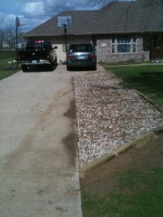 two cars parked in front of a house