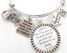 a close up of a bracelet with charms on it