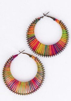 Add a pop of color to your look with these stunning Rainbow Thread-Wrapped Hoop Earrings! Featuring vibrant multicolored threads intricately woven around a durable metal frame, these bold and playful hoops are perfect for making a statement. Lightweight and comfortable, they're ideal for everyday wear or to brighten up your evening outfit. Elevate your accessory game with these unique, eye-catching earrings! Evening Outfit, Evening Outfits, Halloween Shopping, Metal Frame, Jewelry Earrings Dangle, Etsy Earrings, Dangle Drop Earrings, Color Pop, Dangle Earrings