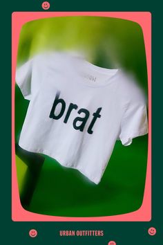 Bumpin' that in this Charli XCX Brat graphic baby tee. Designed in a slim & cropped fit so when you’re looking in the mirror you like what you see. Only at Urban Outfitters. Features Charli XCX Brat graphic baby tee Fitted graphic tee Soft and stretchy knit Crew neckline with short sleeves Brat graphic across the chest Slim fit Cropped length Easy pull-over style UO exclusive Content + Care 100% Cotton Machine wash Imported Size + Fit Model in Green is 5'9" and wearing size Small Measurements taken from size Small Chest: 32" Length: 16.5" | Charli XCX UO Exclusive Brat Graphic Baby Tee in White, Women's at Urban Outfitters Cropped Cotton T-shirt With Text Print, White Logo Print Cropped T-shirt, Sporty Logo Print Crop Top For Summer, Fitted Cropped T-shirt With Letter Print, Logo Print Cropped T-shirt For Spring, Cropped Logo Print T-shirt For Spring, Spring Cropped T-shirt With Logo Print, Fitted Cotton Cropped T-shirt With Graphic Print, Fitted Logo Print Crop Top For Summer