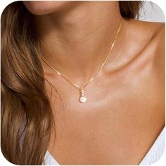 Are You Worried The Women's Necklaces Will Turn Your Neck Green And Allergic? Now, Our Dainty Pearl Drop Necklaces Will Dispel All Your Worries! This Trendy Freshwater Pearl Necklace Chain Is Made Of Real Gold Plating Over Brass, Which Keeps Tarnish-Free, Nickel Free, Lead-Free, Cadmium Free, Hypoallergenic, Long-Lasting, No Stimulation To The Skin And Not Allergies. Gold Aesthetic Pendant Necklace Trendy, Small And Cute Suitable For Everyday Wear. Fasionable Design Of Pearl Necklace: All Freeki Gold Plated Pearl Necklace, Dainty Gold Pearl Necklace For Formal Occasions, Feminine Everyday Gold Pearl Necklace, Wedding Necklaces For Bride Gold, Gold Layered Necklace With Pearl Pendant For Gift, Gold Layered Pearl Chain Necklace For Gift, Feminine Gold Necklace With Pearl Chain, Gold Necklace For Wedding, Elegant Necklaces Classy