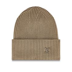 The lv ahead beanie is a versatile ribbed hat with a classic silhouette. This piece features tone-on-tone enamel lv initials on a turned-up cuff. The luxurious accessory is made from pure cashmere for soft warmth and comes in multiple colourways to suit a variety of looks. Jockey Hat, Ribbed Hat, Brown Accessories, Neck Accessories, Knit Hats, Louis Vuitton Official, Head And Neck, Classic Silhouette, Machine Knitting