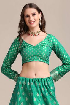 color-green, fabric-jacquard, work-gold woven, brand-name-krupali-savani,occasion-festivewear, occasion-wedding-guest, womenswear,ideal-for-women, lehengas, Product Features: Color: Green Lehenga Fabric: Jacquard Silk Choli Fabric: Jacquard Silk Work: Gold Woven Sleeves: Full Sleeves Neck Type: V Neck Wash Care: Dry Clean Occasion: Festivewear, Wedding Guest Product Type: Lehenga Choli with Dupatta Disclaimer: There will be slight difference in digital to actual image Brocade Sharara With Pallu, Green Long Sleeve Sharara For Seasonal Transitions, Transitional Long Sleeve Green Sharara, Bollywood Banarasi Silk Blouse With Meenakari, Transitional Season Green Choli, Green Anarkali Long Sleeve Choli, Brocade Sharara For Festivals, Green Blouse For Eid Reception, Festive Meenakari Art Silk Blouse