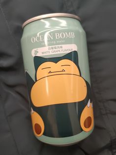 a can of canned drink with an image of a cat on it's side