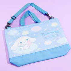 Kawaii-fy your look by bringing this super cute two-way bag with you! It can be used as a handbag or sling bag once the adjustable bag strap has been attached! It’s also decorated with an illustration of Cinnamoroll with angel wings. Made from water-repellent polyester with antibacterial properties Features an easy-to- Kawaii Large Capacity Tote Satchel, Kawaii Satchel Tote For Daily Use, Kawaii Rectangular Bag With Adjustable Strap, Kawaii Rectangular Shoulder Bag With Cute Design, Kawaii Handheld Bags For Everyday Use, Kawaii Travel Tote Satchel, Kawaii Satchel Tote For Travel, Kawaii Travel Satchel Tote, Kawaii Tote Shoulder Bag For Daily Use