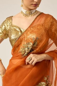 Tangerine orange with sequin, cutdana and thread embroidered motifs. Paired with a gold padded blouse. - Aza Fashions Saree Gowns, Dhoti Saree, Cotton Sarees Handloom, Orange Saree, Embroidered Motifs, Ruffle Saree, Padded Blouse, Lehenga Saree, Tangerine Orange